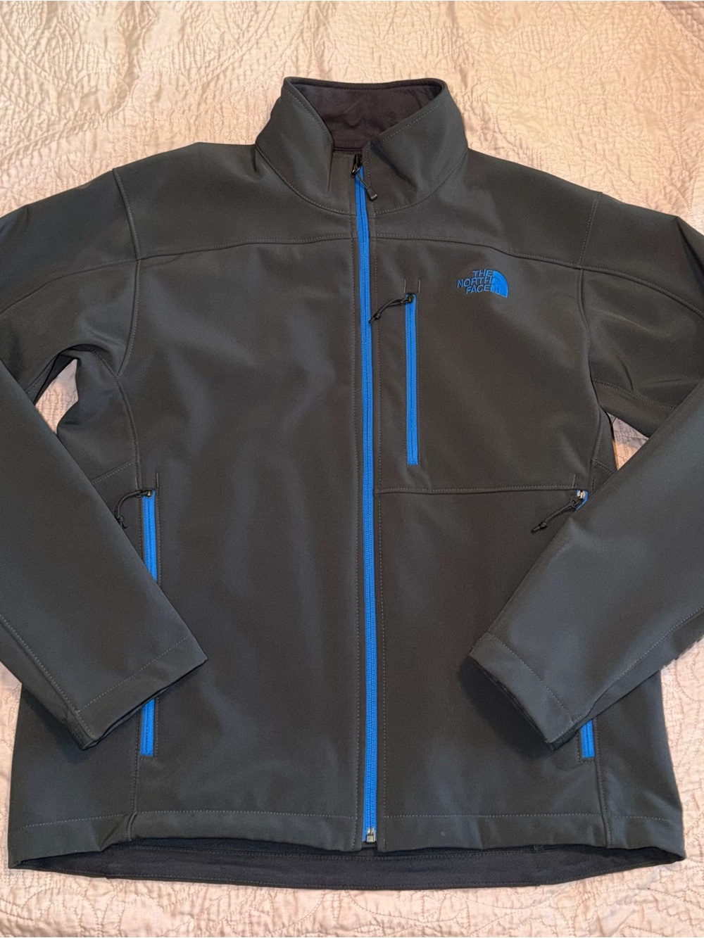 The North Face Men’s Charcoal Softshell Jacket with Blue Zippers